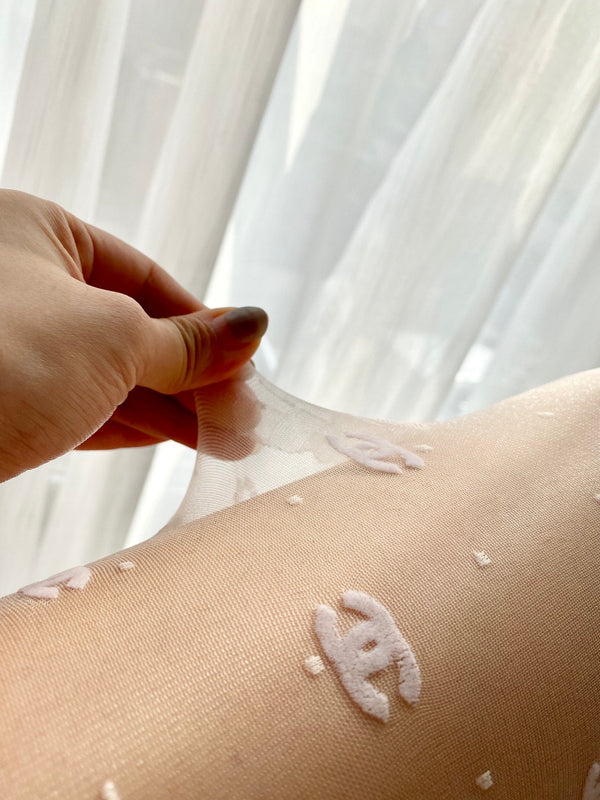 CC polka dot butterfly fishnet pantyhose