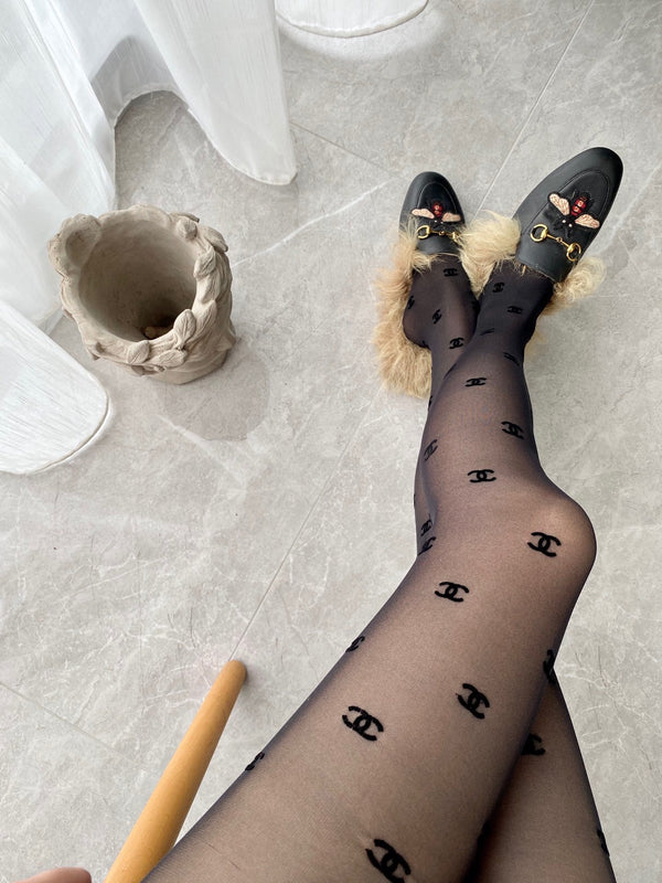 CC high-end flocked logo haute couture pantyhose