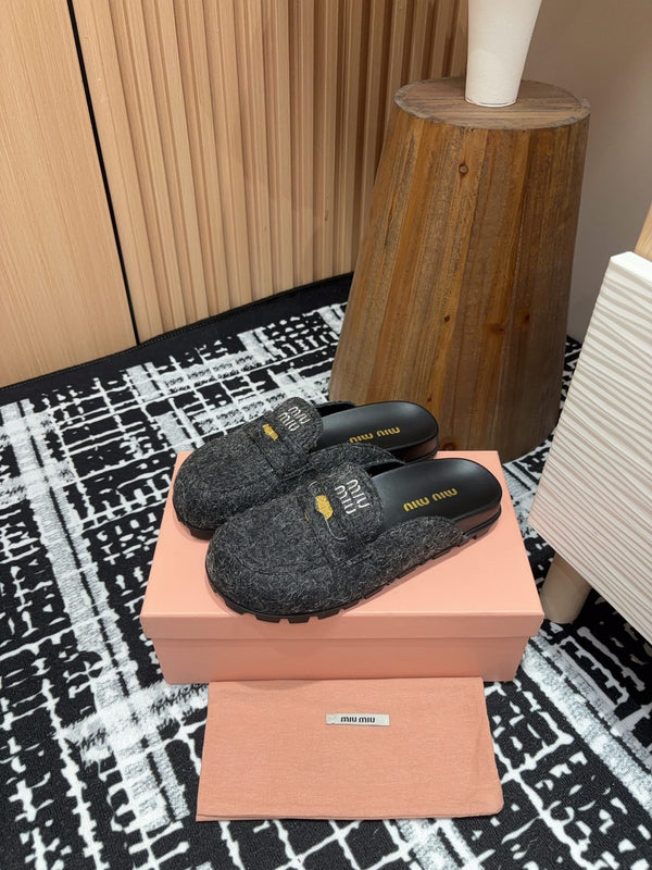 Miu slippers Black Original Wool