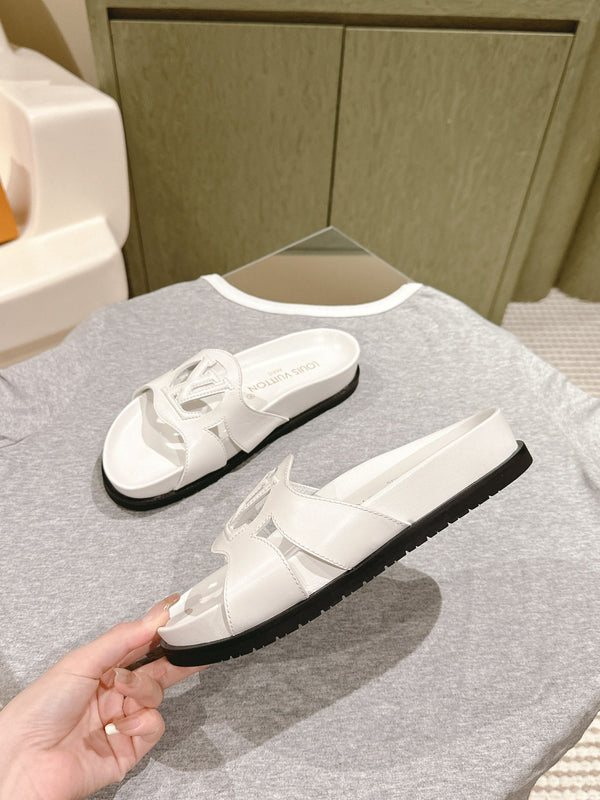 lv sandal isola flat mule white calfskin