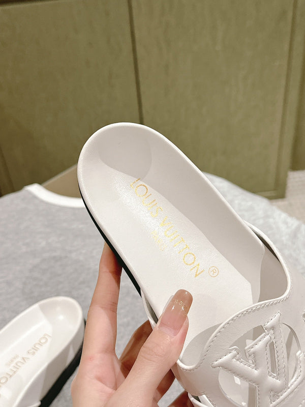 lv sandal isola flat mule white calfskin