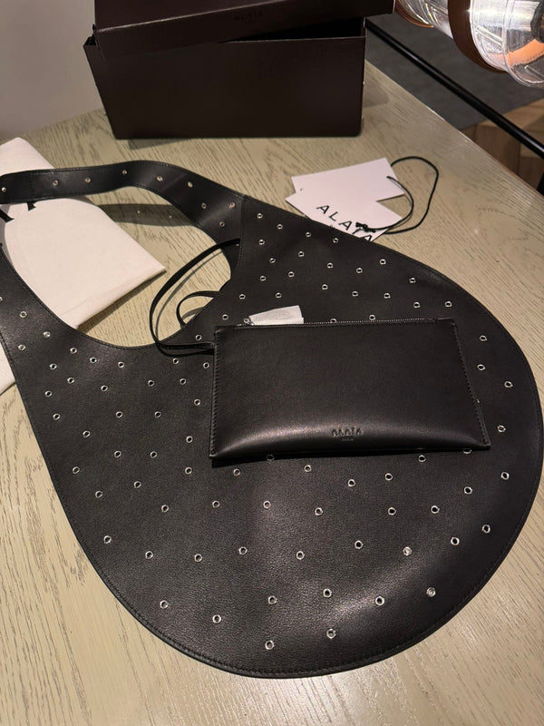 ONE PIECE MEDIUM BAG 39 IN BLACK SHEEPSKIN EYELET DETAILING