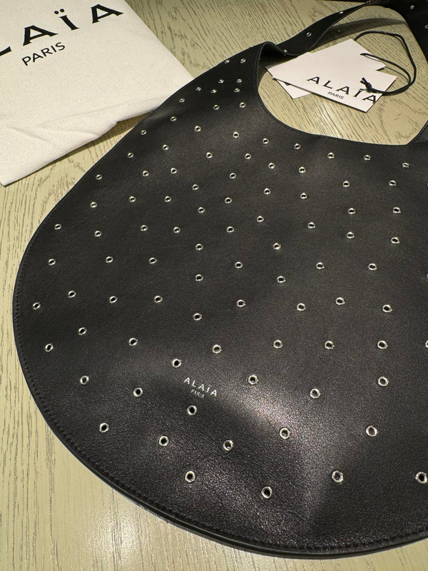 ONE PIECE MEDIUM BAG 39 IN BLACK SHEEPSKIN EYELET DETAILING