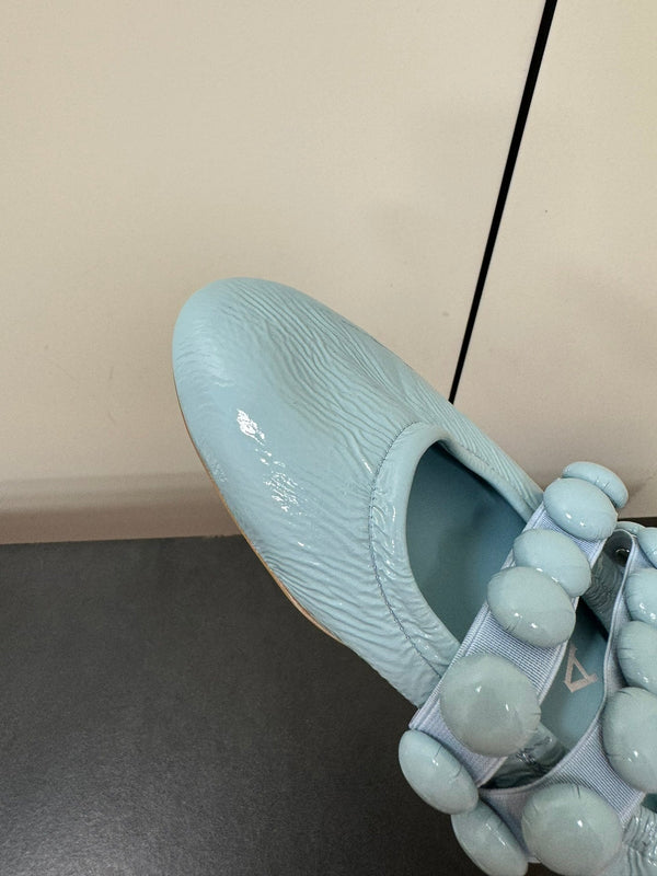 ALAIA SPHERE BALLET FLATS IN LIGHT BLUE LAMBSKIN