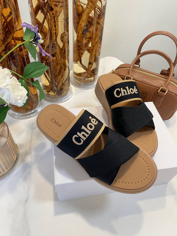 CHLOÉ WOODY WEDGE SANDALS IN BLACK CANVAS WITH CIDER BROWN RUBBER SOLE