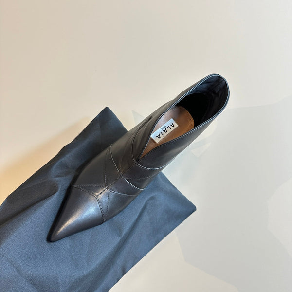 Alaila Heeled Ankle Boots 85mm In Black Cowhide 921036