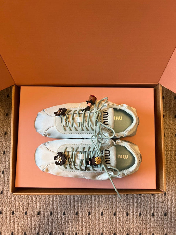 Miu Miu 2026 Plume Sneaker With Floral Charm Light Blue Satin 621342